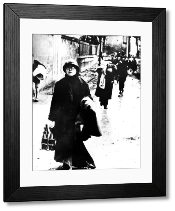 Framed Print : Refugees leaving a Normandy town, France, World War II, 1940-1944 Framed Print : Refugees leaving a Normandy town, France, World War II, 1940-1944