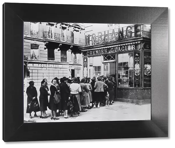 Queue of women outside a dairy shop, German-occupied Paris, 28 June 1940