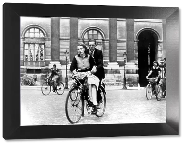 Parisians travelling by bicycle, German-occupied Paris, July 1940