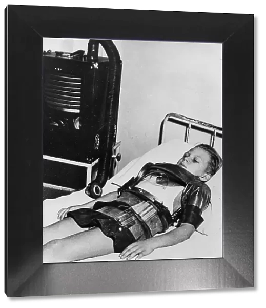 Eleven yeat old boy in an iron lung, Beaujon Hospital, Paris, c1947-1951