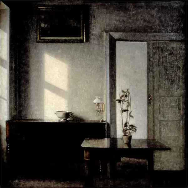 Interior with potted plant on card table, 1910-1911. Artist: Hammershoi, Vilhelm (1864-1916)