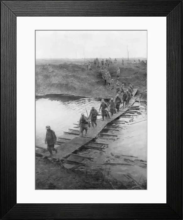 Framed Print : German prisoners on a duckboard track at the Yser Canal, Belgium, 31 July 1917