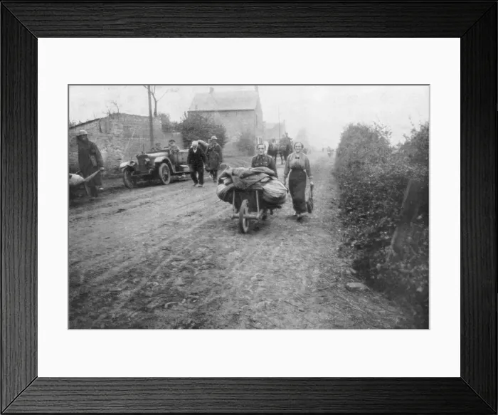Framed Print : A British soldier helping a woman return to her village, France, 1918 Framed Print : A British soldier helping a woman return to her village, France, 1918