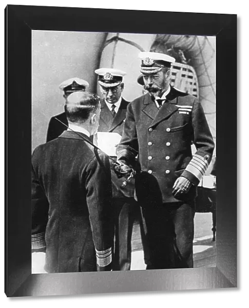 King George V knights Vice-Admiral Pakenham aboard HMS Princess Royal, c1930s