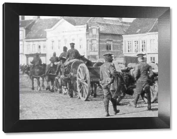 British horse-drawn artillery in a Belgian village, August 1914