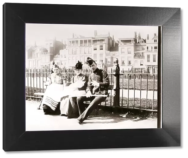 People on a bench, Rotterdam, 1898. Artist: James Batkin