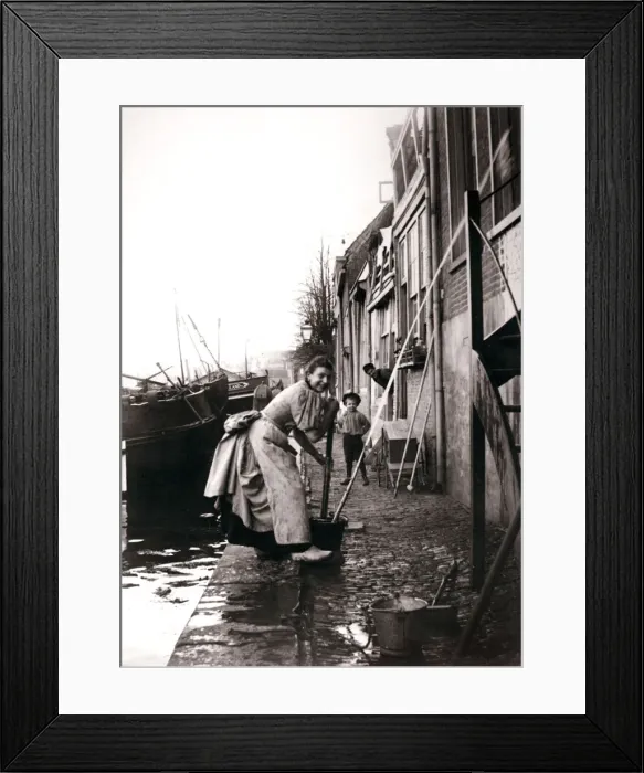 Framed Print : Woman mopping the street, Dordrecht, Netherlands, 1898. Artist: James Batkin Framed Print : Woman mopping the street, Dordrecht, Netherlands, 1898. Artist: James Batkin