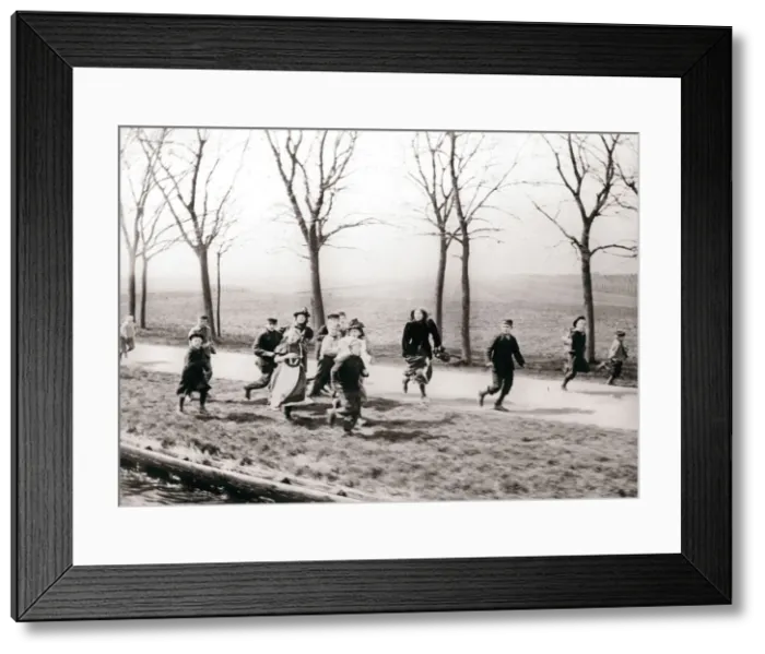 Framed Print : Children running alongside a canal, Monnickendam, Netherlands, 1898. Artist: James Batkin Framed Print : Children running alongside a canal, Monnickendam, Netherlands, 1898. Artist: James Batkin