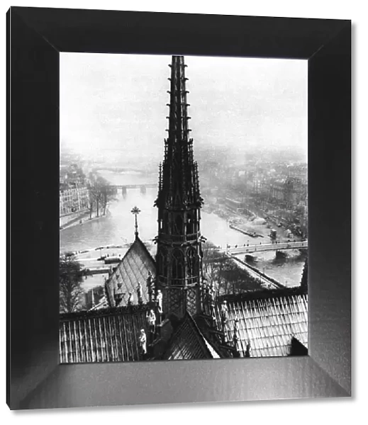 The spire of Notre Dame seen from the towers, Paris, 1931. Artist: Ernest Flammarion