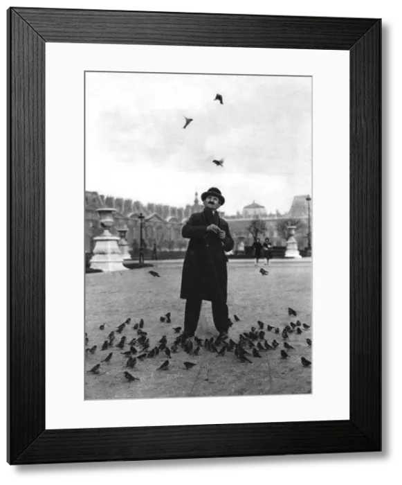 Framed Print : A bird charmer, Paris, 1931. Artist: Ernest Flammarion Framed Print : A bird charmer, Paris, 1931. Artist: Ernest Flammarion