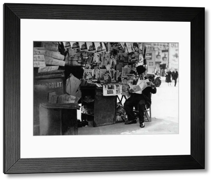 Framed Print : Newspaper stand, Paris, 1931. Artist: Ernest Flammarion