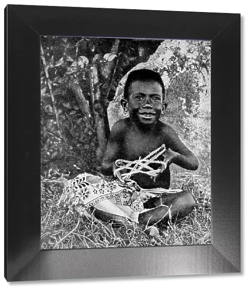 Kiwai child, living at the entrance to the Fly River, New Guinea, 1922. Artist: WN Beaver