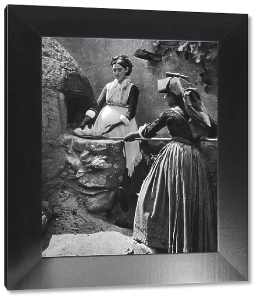 Women at the oven, Sardinia, Italy, 1937. Artist: Martin Hurlimann