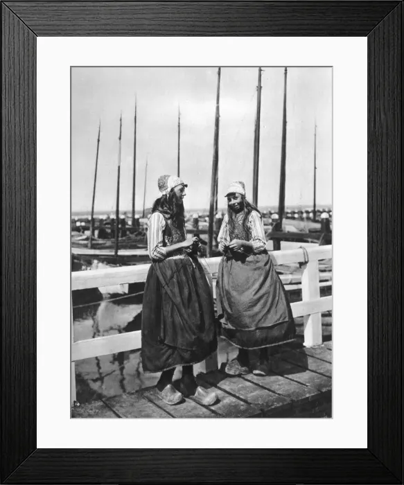 Framed Print : Two girls on the landing stage, Marken, Netherlands, c1934 Framed Print : Two girls on the landing stage, Marken, Netherlands, c1934