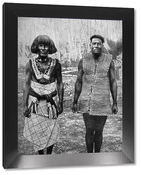 The ceremonial costume of war and everyday waist-cloth, Gilbert Islands, 1922. Artist: Thomas McMahon