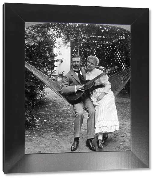 The Musical Pair in the Hammock. Artist: American Stereoscopic Company