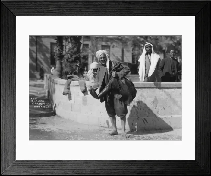 Framed Print : A water carrier in Damascus, Syria, c1920s-c1930s(?) Framed Print : A water carrier in Damascus, Syria, c1920s-c1930s(?)