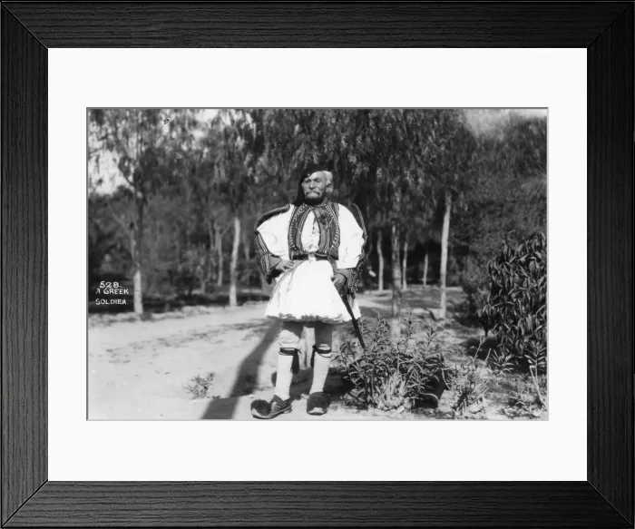 Framed Print : A Greek soldier in traditional uniform, c1920s-c1930s(?) Framed Print : A Greek soldier in traditional uniform, c1920s-c1930s(?)