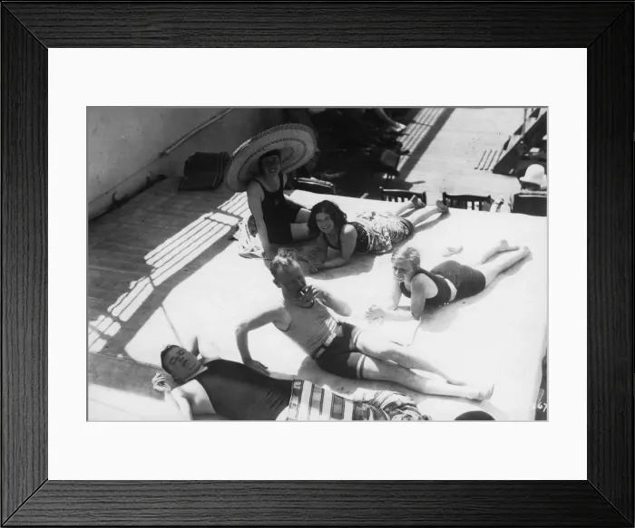 Framed Print : Passengers sunbathing on board a cruise ship, c1920s-c1930s(?) Framed Print : Passengers sunbathing on board a cruise ship, c1920s-c1930s(?)