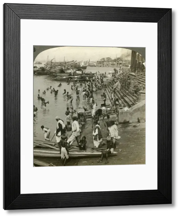 Framed Print : Bathing at a Ghat on the Ganges, Calcutta, India, c1900s(?). Artist: Underwood & Underwood Framed Print : Bathing at a Ghat on the Ganges, Calcutta, India, c1900s(?). Artist: Underwood & Underwood
