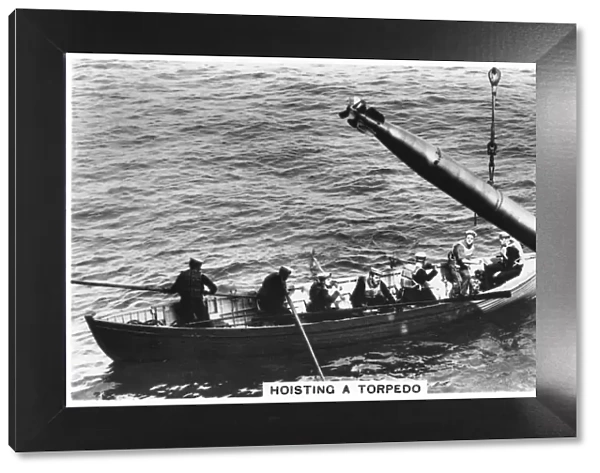 Hoisting a torpedo, HMS Courageous, 1937