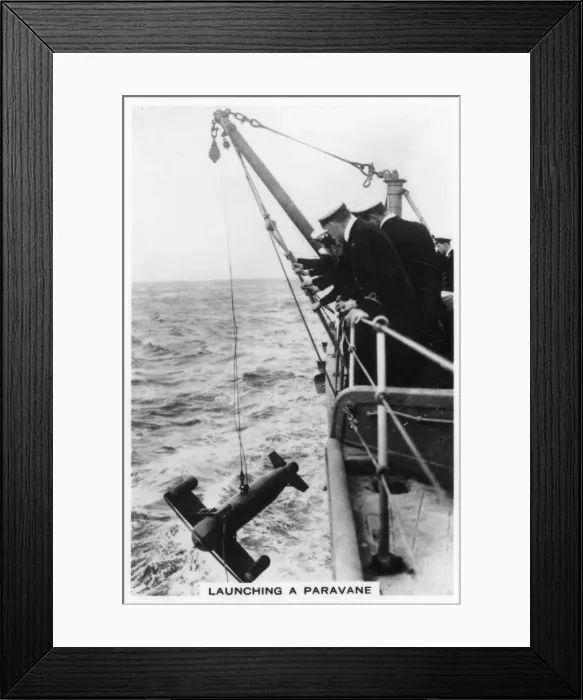 Framed Print : Launching a paravane from the battleship HMS Rodney, 1937 Framed Print : Launching a paravane from the battleship HMS Rodney, 1937