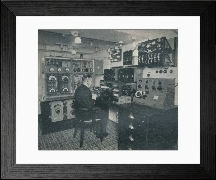 Framed Print : A Marconi wireless operator receiving wireless messages as the Empress of Britain crosses the Atlan Framed Print : A Marconi wireless operator receiving wireless messages as the Empress of Britain crosses the Atlan