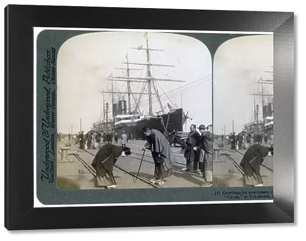 Greeting for newcomers on the pier alongside the Pacific Mail SS China, Yokohama, Japan, 1904. Artist: Underwood & Underwood