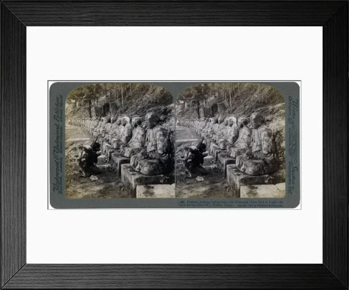 Framed Print : Peasant praying before a row of statues of the God of Light, Daiya river, Nikko, Japan, 1904. Artist: Underwood & Underwood Framed Print : Peasant praying before a row of statues of the God of Light, Daiya river, Nikko, Japan, 1904. Artist: Underwood & Underwood