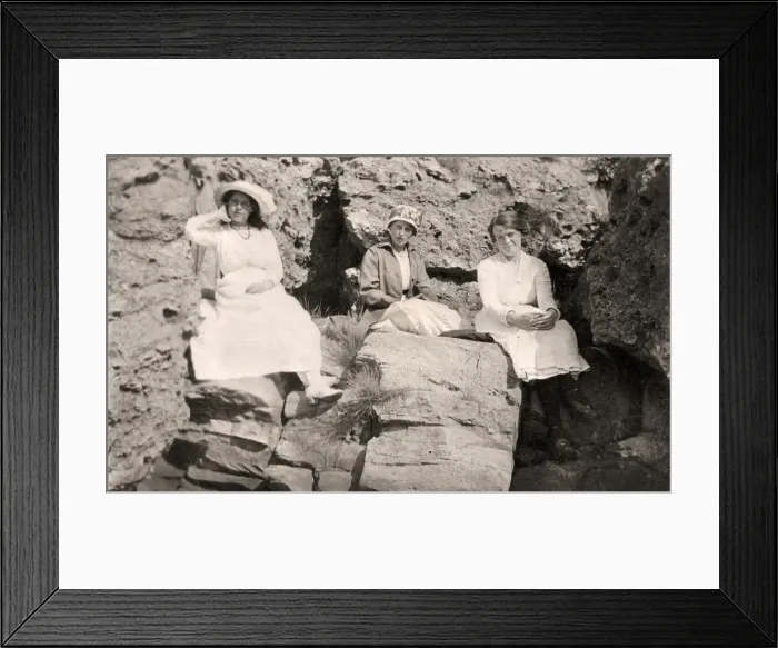 Framed Print : Three women relaxing on rocks, early 20th century Framed Print : Three women relaxing on rocks, early 20th century