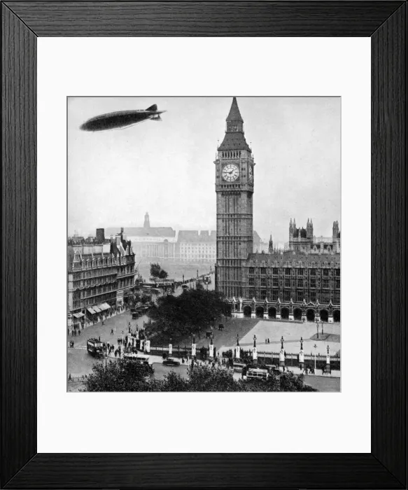Framed Print : The R101 passing over the House of Commons, 14th October 1929 (1936) Framed Print : The R101 passing over the House of Commons, 14th October 1929 (1936)