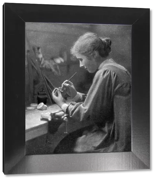 A craftswoman at work, 1911-1912. Artist: ET Holding