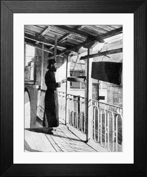 Framed Print : Monk sounding the call to prayer on a gong, Greece, 1936. Artist: Nomias Framed Print : Monk sounding the call to prayer on a gong, Greece, 1936. Artist: Nomias
