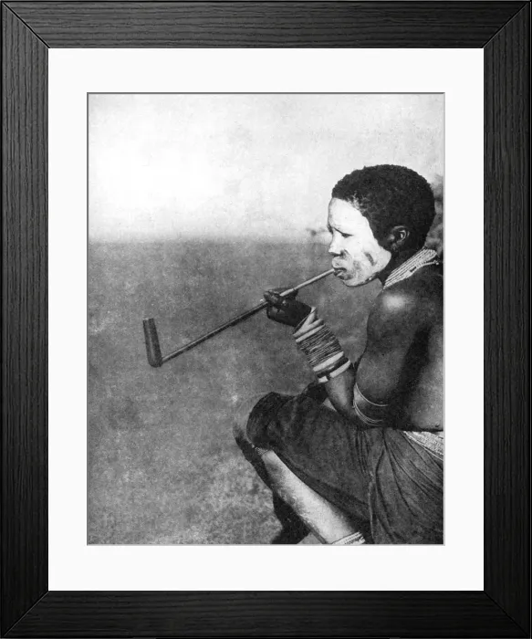 Framed Print : A South African tribesman smoking, 1936. Artist: South African Railways Framed Print : A South African tribesman smoking, 1936. Artist: South African Railways
