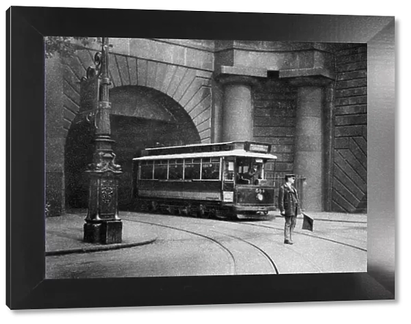 A tram running beneath Kingsway, Aldwych and Somerset House, London, 1926-1927