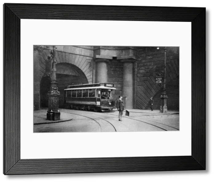 Framed Print : A tram running beneath Kingsway, Aldwych and Somerset House, London, 1926-1927 Framed Print : A tram running beneath Kingsway, Aldwych and Somerset House, London, 1926-1927