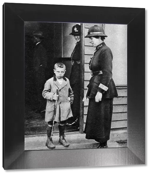 An East End child and a policewoman, London, 1926-1927