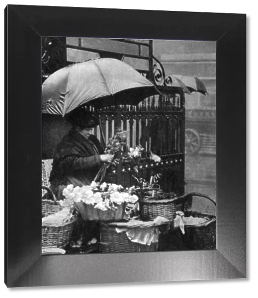 Flower seller, Piccadilly Circus, London, 1926-1927