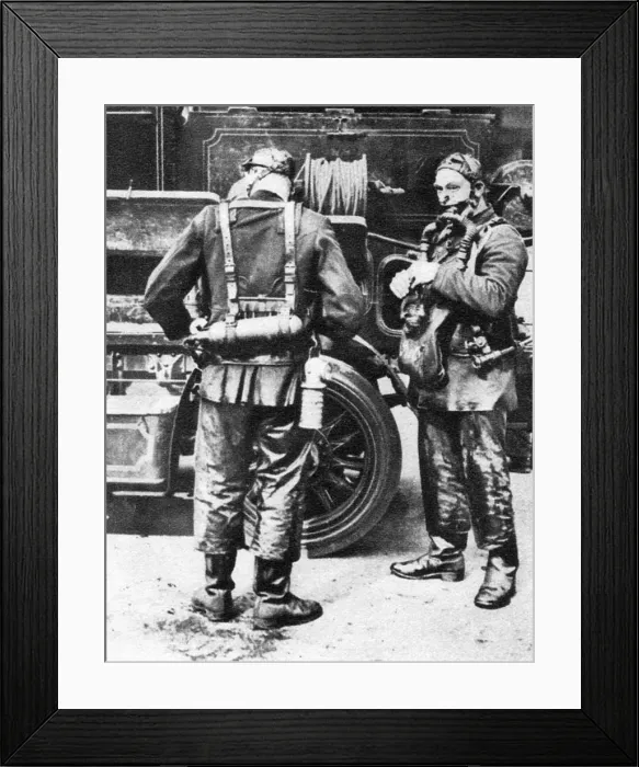 Framed Print : Firefighters donning smoke helmets, Farringdon Street rubber works, London, 1926-1927