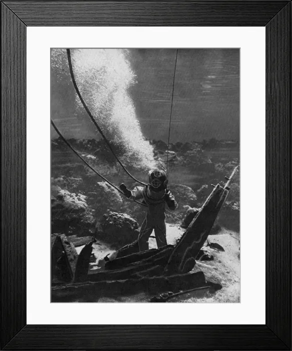 Framed Print : The first photograph of a diver under water, late 19th century, (c1920) Framed Print : The first photograph of a diver under water, late 19th century, (c1920)