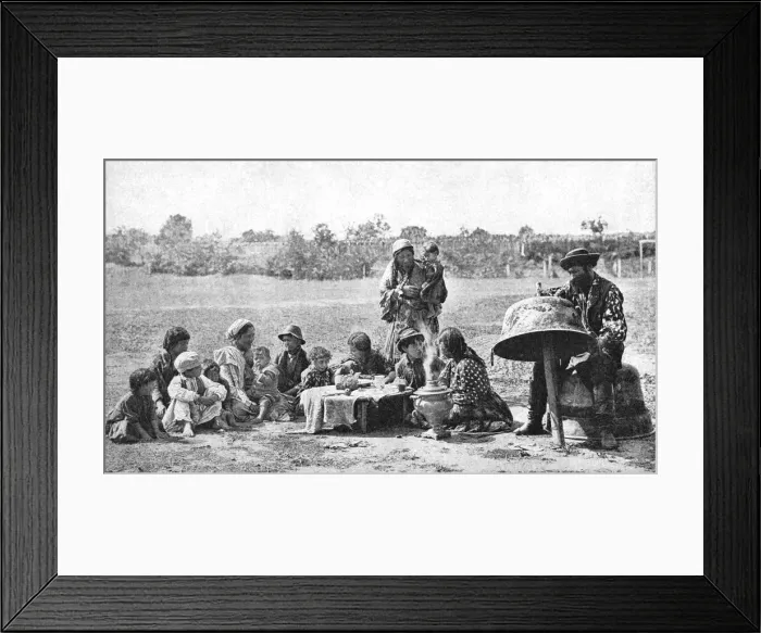 Framed Print : Gypsies mending a family cauldron, Hungary, 1922. Artist: AW Cutler