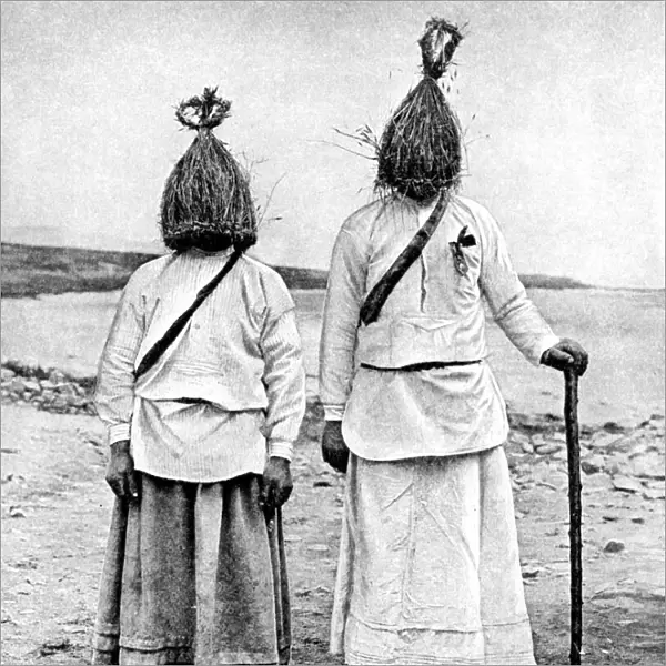 A pair of straw boys, Ireland, 1922. Artist: AW Cutler