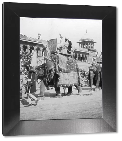 An elephant procession passing Jumma Masjid, Delhi, India, 1900s. Artist: H Hands & Son
