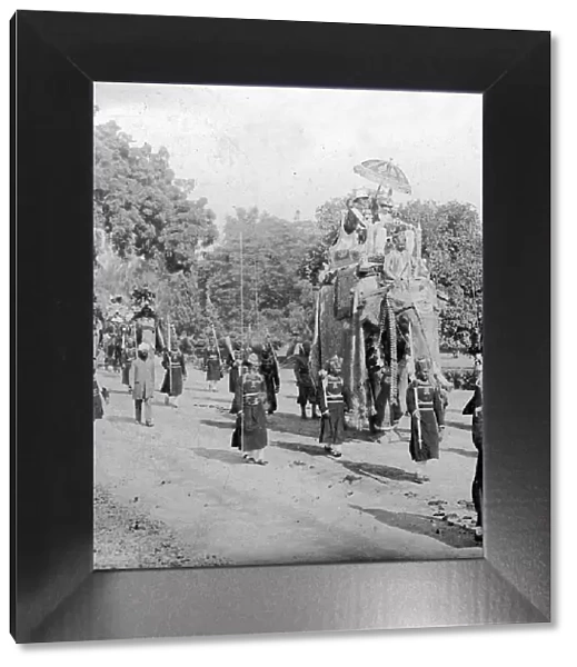 Lord and Lady Harding riding an elephant, India, 1913. Artist: HD Girdwood