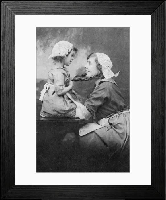 Framed Print : Mother and daughter, early 20th century Framed Print : Mother and daughter, early 20th century