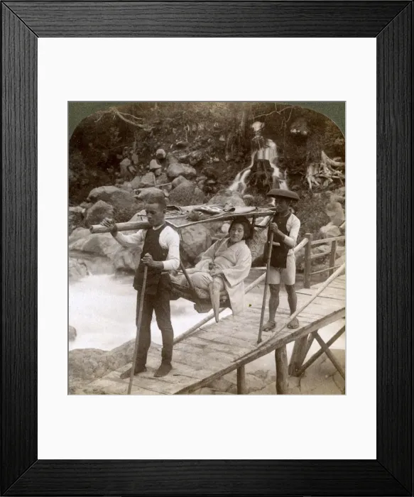 Framed Print : Japanese woman in a yamakago (mountain chair) crossing the torrential Daiya river near Nikko, Japan, Artist: Underwood & Underwood Framed Print : Japanese woman in a yamakago (mountain chair) crossing the torrential Daiya river near Nikko, Japan, Artist: Underwood & Underwood