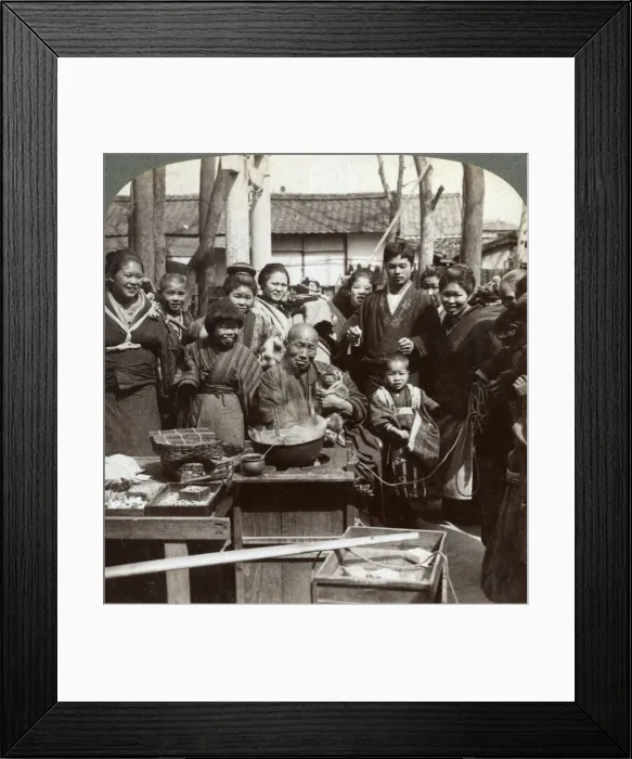 Framed Print : A street performer with a monkey amusing the crowd, Kobe, Japan, 1896. Artist: Underwood & Underwood Framed Print : A street performer with a monkey amusing the crowd, Kobe, Japan, 1896. Artist: Underwood & Underwood