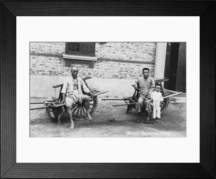 Framed Print : Men with wheelbarrows, Vietnam(?), 20th century Framed Print : Men with wheelbarrows, Vietnam(?), 20th century