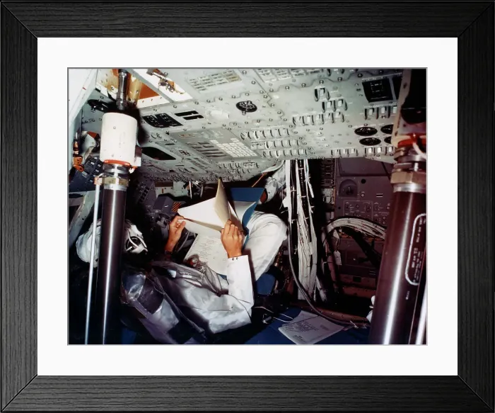 Framed Print : An astronaut inside a NASA Command Module, 1970s. Artist: NASA Framed Print : An astronaut inside a NASA Command Module, 1970s. Artist: NASA