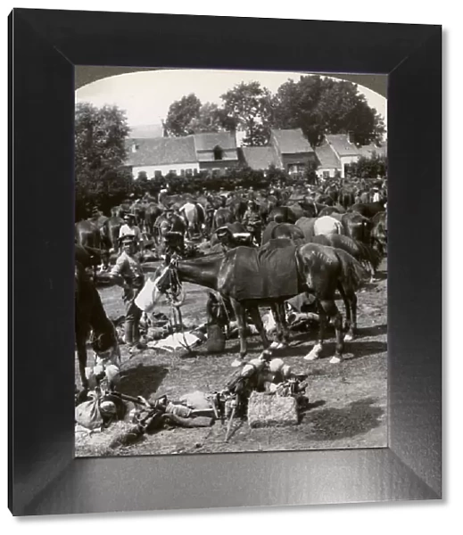 Troops feeding their horses and resting on the march, World War I, 1914-1918. Artist: Realistic Travels Publishers